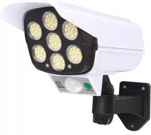 NAŚWIETLACZ SOLARNY LED 5W PIR LAMPA ELEWACYJNA BIAŁA ATRAPA KAMERY PILOT Naświetlacze