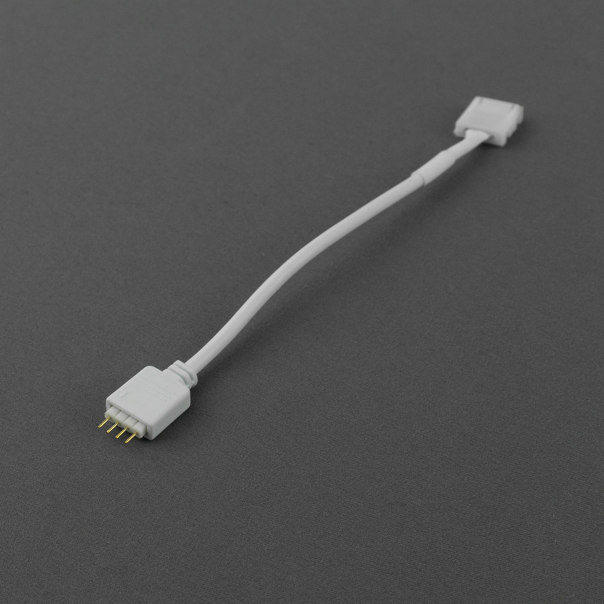 Złączka LED RGB 10mm 4 piny / zatrzask 1 Złączka LED RGB 10mm 4 piny / zatrzask — oświetlenie LED